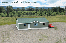 Modular home for model train building